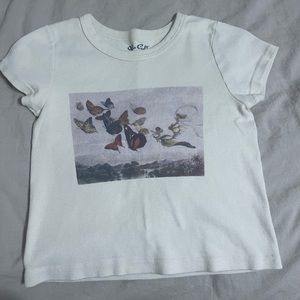 Brandy Melville Flower Butterfly atop